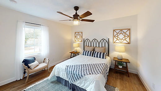 Lighted bedroom in a luxury home