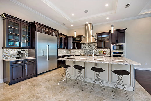 Dining area with seating in a luxury home