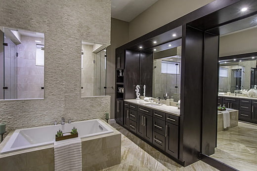 Bathtub and sink in a new transitional home