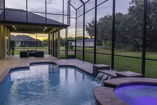 Spa and pool in a backyard